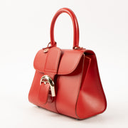 Shop this authentic Delvaux Lipstick Box Calf Brillant Mini Bag pre-loved on Labellov.com
