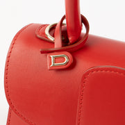 Shop this authentic Delvaux Lipstick Box Calf Brillant Mini Bag pre-loved on Labellov.com