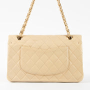 Shop this authentic Chanel Beige Lambskin Medium Classic 11.12 Handbag Pre-Loved on Labellov.com
