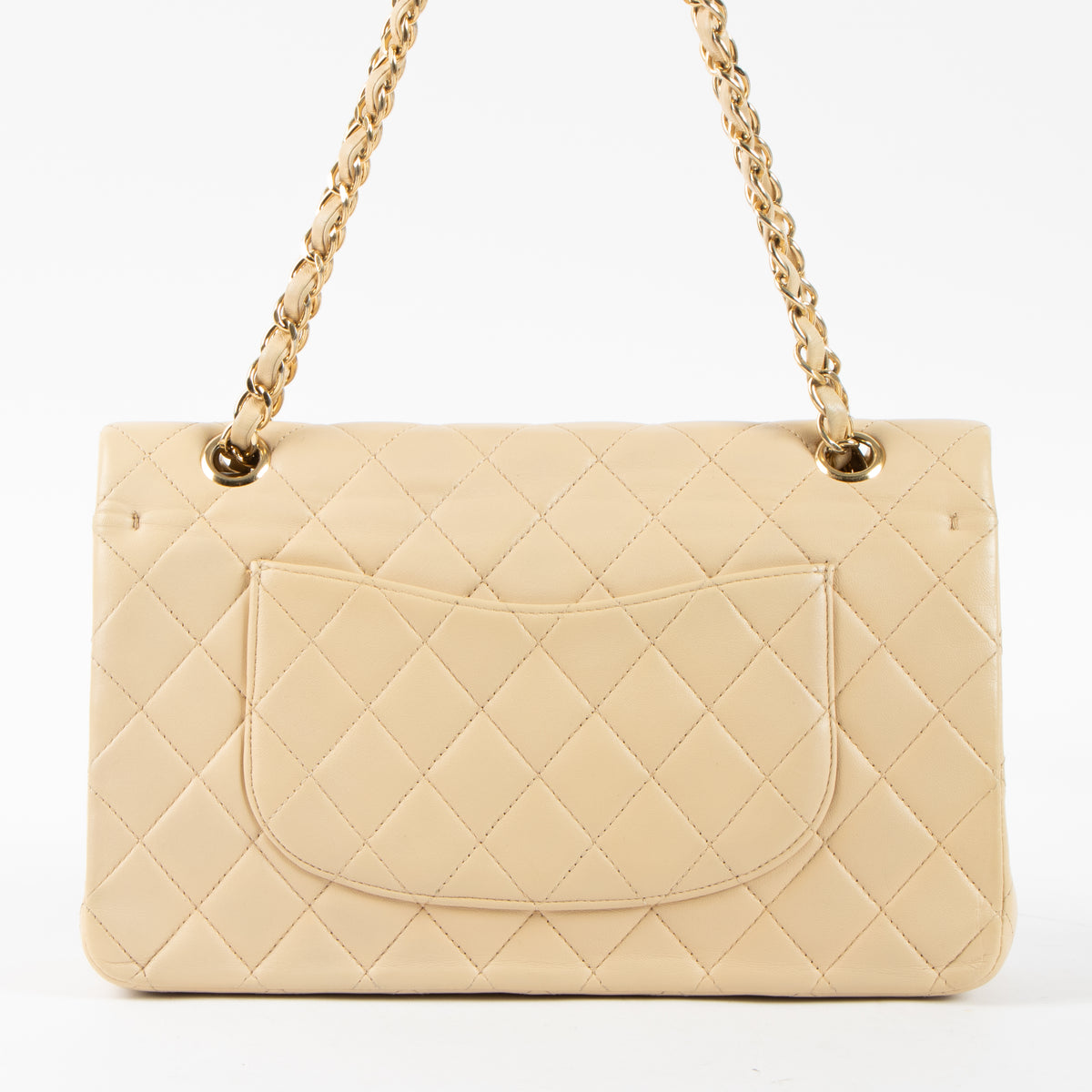Shop this authentic Chanel Beige Lambskin Medium Classic 11.12 Handbag Pre-Loved on Labellov.com