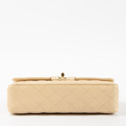 Shop this authentic Chanel Beige Lambskin Medium Classic 11.12 Handbag Pre-Loved on Labellov.com