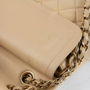 Shop this authentic Chanel Beige Lambskin Medium Classic 11.12 Handbag Pre-Loved on Labellov.com