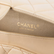 Shop this authentic Chanel Beige Lambskin Medium Classic 11.12 Handbag Pre-Loved on Labellov.com