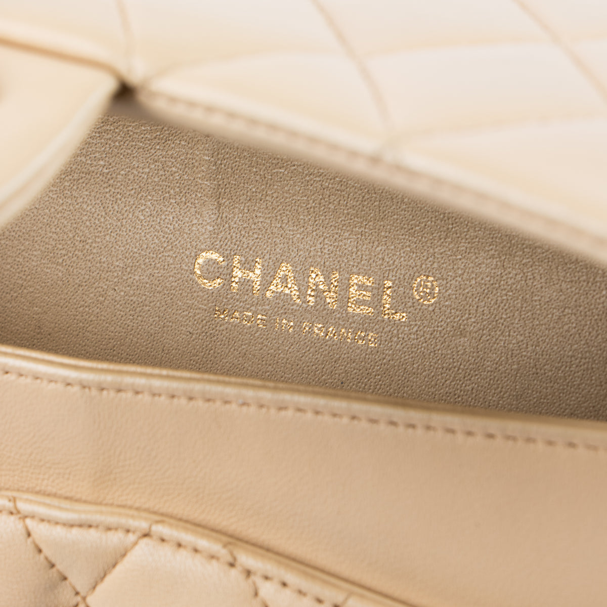 Shop this authentic Chanel Beige Lambskin Medium Classic 11.12 Handbag Pre-Loved on Labellov.com