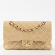 Shop this authentic Chanel Beige Lambskin Medium Classic 11.12 Handbag Pre-Loved on Labellov.com