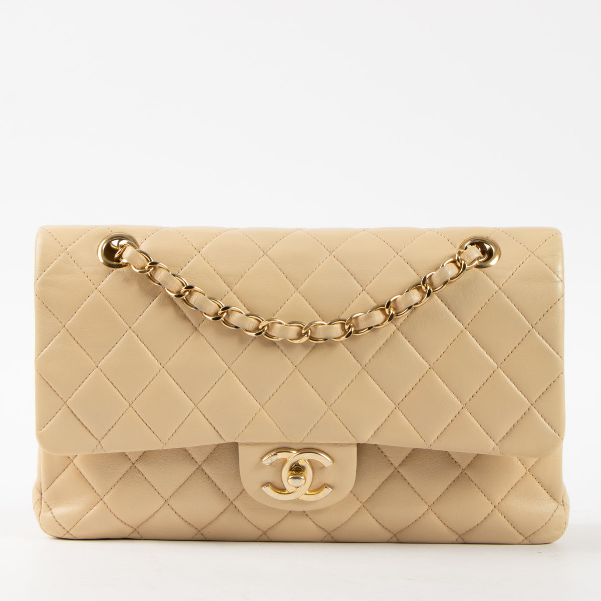 Shop this authentic Chanel Beige Lambskin Medium Classic 11.12 Handbag Pre-Loved on Labellov.com