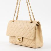 Shop this authentic Chanel Beige Lambskin Medium Classic 11.12 Handbag Pre-Loved on Labellov.com