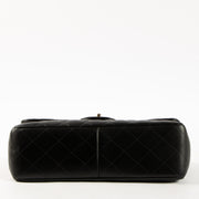 Shop this authentic luxury Chanel Black Lambskin Large/Jumbo Classic Bag Pre-Loved on Labellov.com