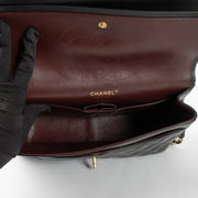Shop this authentic luxury Chanel Black Lambskin Large/Jumbo Classic Bag Pre-Loved on Labellov.com