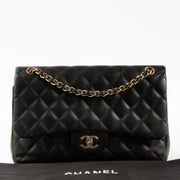 Shop this authentic luxury Chanel Black Lambskin Large/Jumbo Classic Bag Pre-Loved on Labellov.com