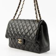 Shop this authentic Chanel Black Lambskin Large/Jumbo Classic Bag pre-loved on Labellov.com