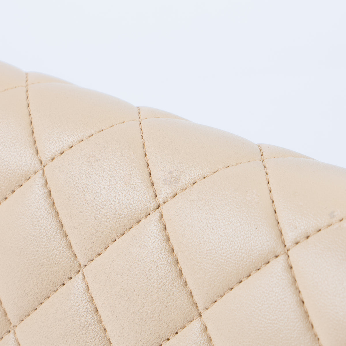Shop this authentic Chanel Beige Lambskin Medium Classic 11.12 Handbag pre-loved on Labellov.com