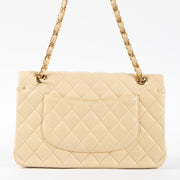 Shop this authentic Chanel Beige Lambskin Medium Classic 11.12 Handbag pre-loved on Labellov.com