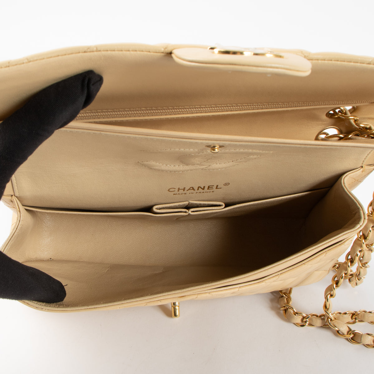 Shop this authentic Chanel Beige Lambskin Medium Classic 11.12 Handbag pre-loved on Labellov.com