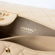 Shop this authentic Chanel Beige Lambskin Medium Classic 11.12 Handbag pre-loved on Labellov.com