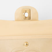 Shop this authentic Chanel Beige Lambskin Medium Classic 11.12 Handbag pre-loved on Labellov.com
