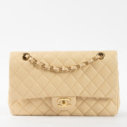 Shop this authentic Chanel Beige Lambskin Medium Classic 11.12 Handbag pre-loved on Labellov.com