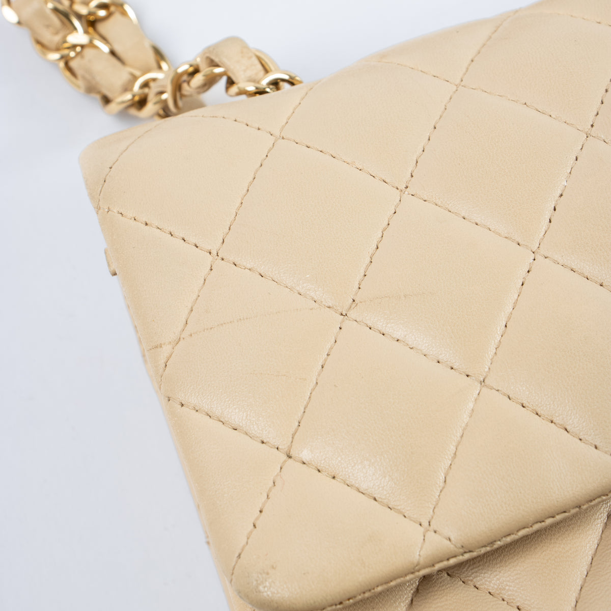 Shop this authentic Chanel Beige Lambskin Medium Classic 11.12 Handbag pre-loved on Labellov.com