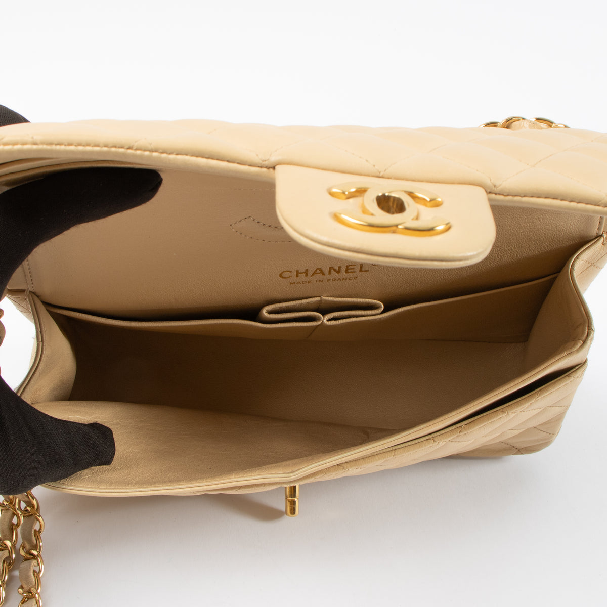Shop this authentic Chanel Beige Lambskin Medium Classic 11.12 Handbag pre-loved on Labellov.com