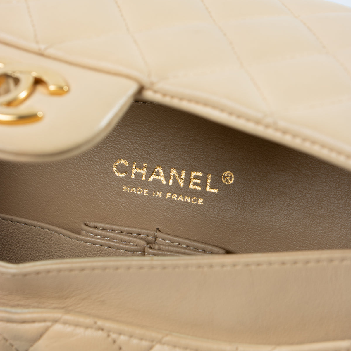 Shop this authentic Chanel Beige Lambskin Medium Classic 11.12 Handbag pre-loved on Labellov.com