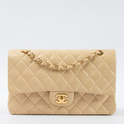 Shop this authentic Chanel Beige Lambskin Medium Classic 11.12 Handbag pre-loved on Labellov.com