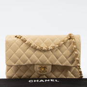 Shop this authentic Chanel Beige Lambskin Medium Classic 11.12 Handbag pre-loved on Labellov.com