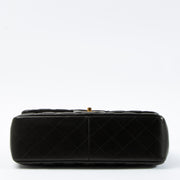 Shop this authentic Chanel Black Lambskin Large/Jumbo Classic Handbag pre-loved on Labellov.com 