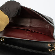 Shop this authentic Chanel Black Lambskin Large/Jumbo Classic Handbag pre-loved on Labellov.com 