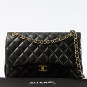 Shop this authentic Chanel Black Lambskin Large/Jumbo Classic Handbag pre-loved on Labellov.com 