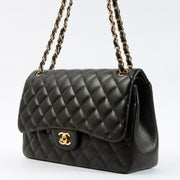 Shop this authentic Chanel Black Lambskin Large/Jumbo Classic Handbag pre-loved on Labellov.com 