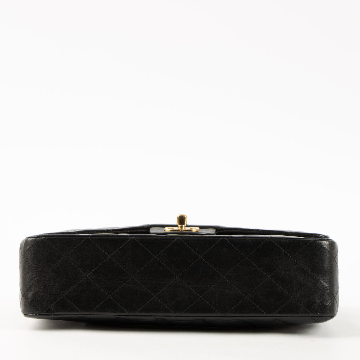 Shop this authentic Chanel Black Lambskin Medium Classic 11.12 Handbag pre-loved on Labellov.com