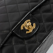 Shop this authentic Chanel Black Lambskin Medium Classic 11.12 Handbag pre-loved on Labellov.com