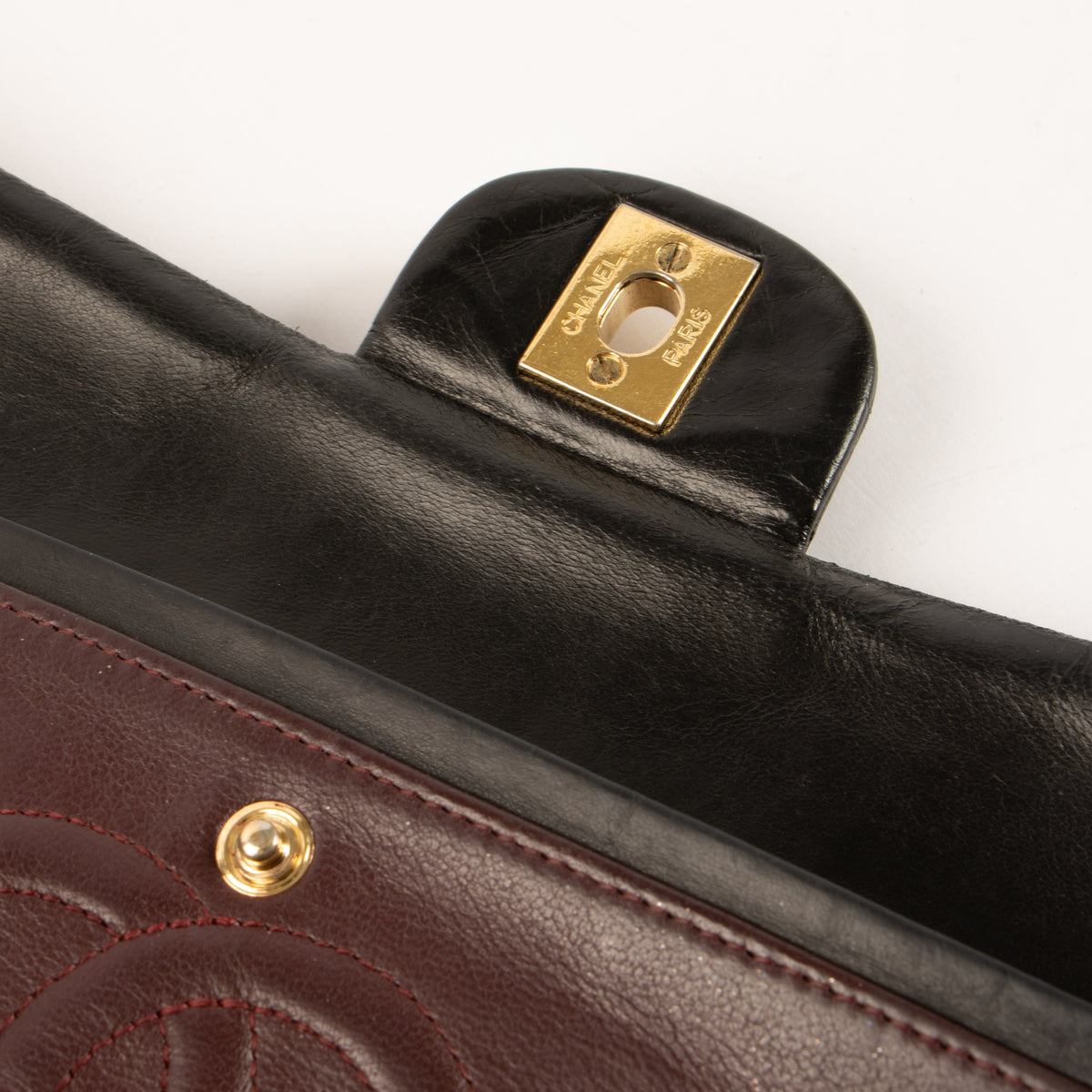 Shop this authentic Chanel Black Lambskin Medium Classic 11.12 Handbag pre-loved on Labellov.com