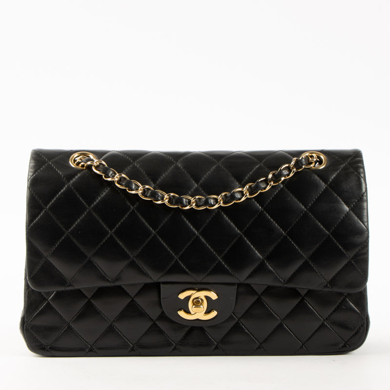Shop this authentic Chanel Black Lambskin Medium Classic 11.12 Handbag pre-loved on Labellov.com