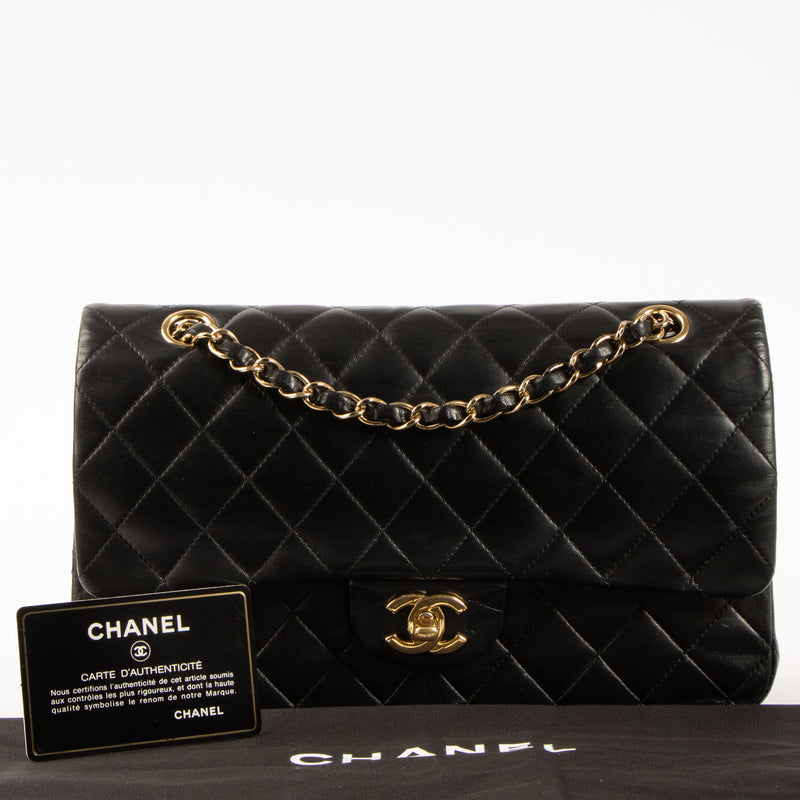 Shop this authentic Chanel Black Lambskin Medium Classic 11.12 Handbag pre-loved on Labellov.com