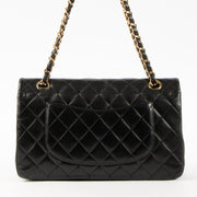 Shop this authentic Chanel Black Lambskin Medium Classic 11.12 Handbag pre-loved on Labellov.com