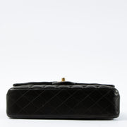 Shop this authentic Chanel Black Lambskin Medium Classic 11.12 Handbag pre-loved on Labellov.com 