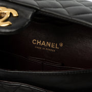 Shop this authentic Chanel Black Lambskin Medium Classic 11.12 Handbag pre-loved on Labellov.com 
