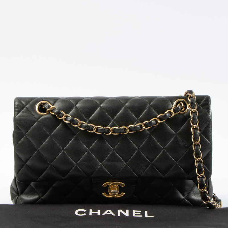 Shop this authentic Chanel Black Lambskin Medium Classic 11.12 Handbag pre-loved on Labellov.com 