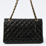 Shop this authentic Chanel Black Lambskin Medium Classic 11.12 Handbag pre-loved on Labellov.com 