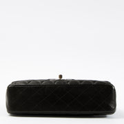Shop this authentic Chanel Black Lambskin Medium Classic 11.12 Handbag pre-loved on Labellov.com