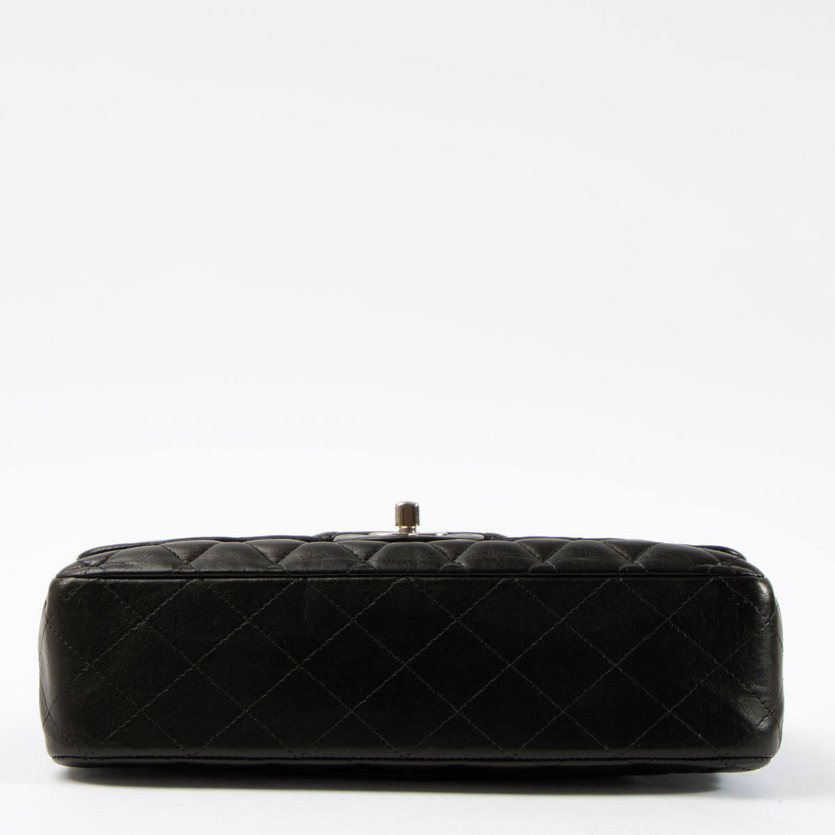 Shop this authentic Chanel Black Lambskin Medium Classic 11.12 Handbag pre-loved on Labellov.com