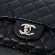 Shop this authentic Chanel Black Lambskin Medium Classic 11.12 Handbag pre-loved on Labellov.com