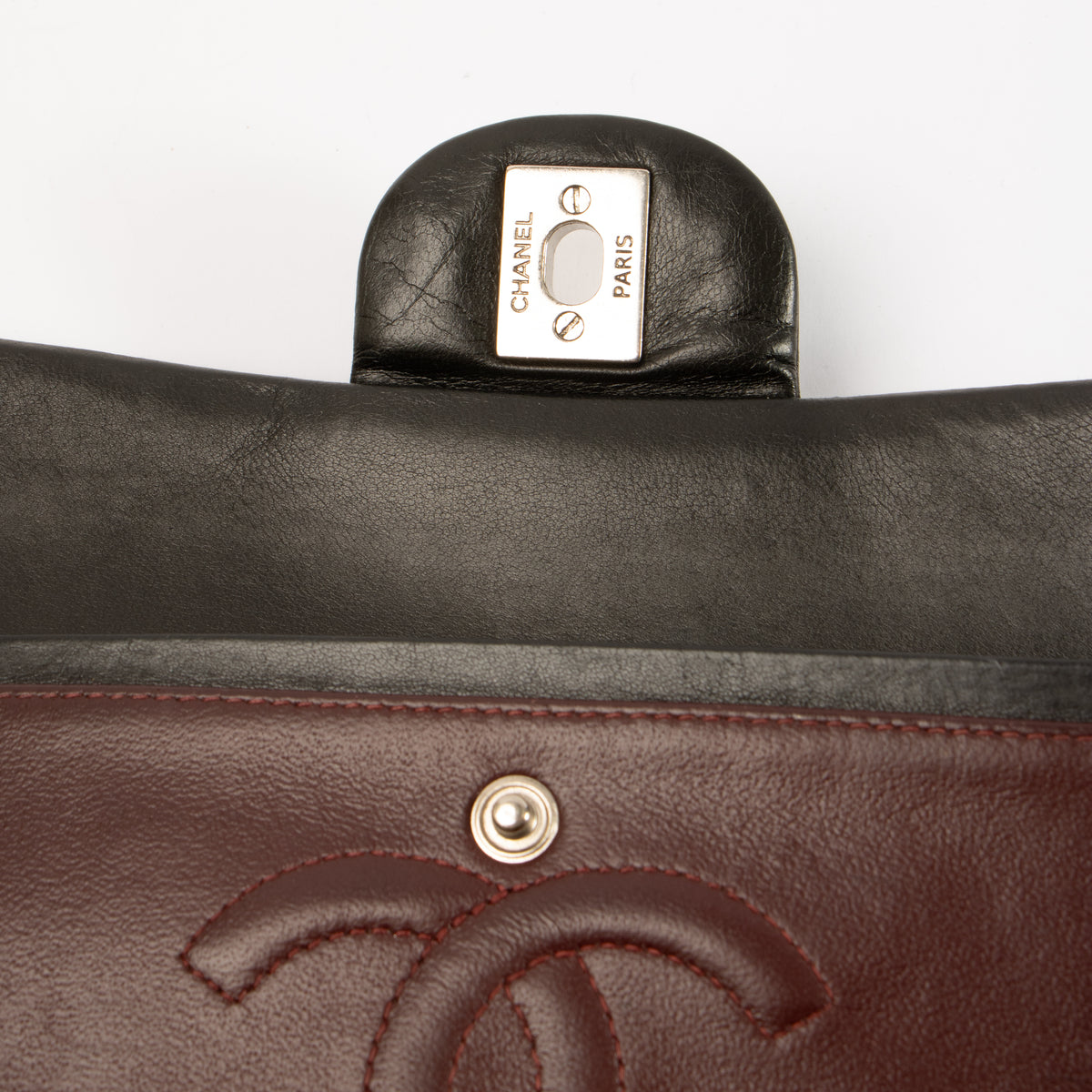 Shop this authentic Chanel Black Lambskin Medium Classic 11.12 Handbag pre-loved on Labellov.com