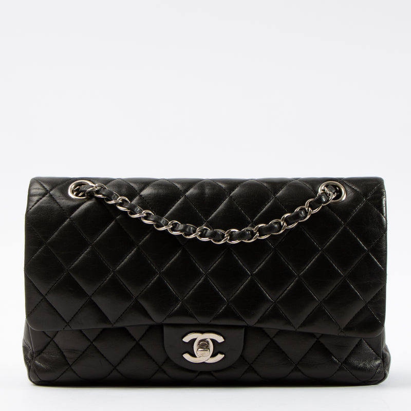 Shop this authentic Chanel Black Lambskin Medium Classic 11.12 Handbag pre-loved on Labellov.com