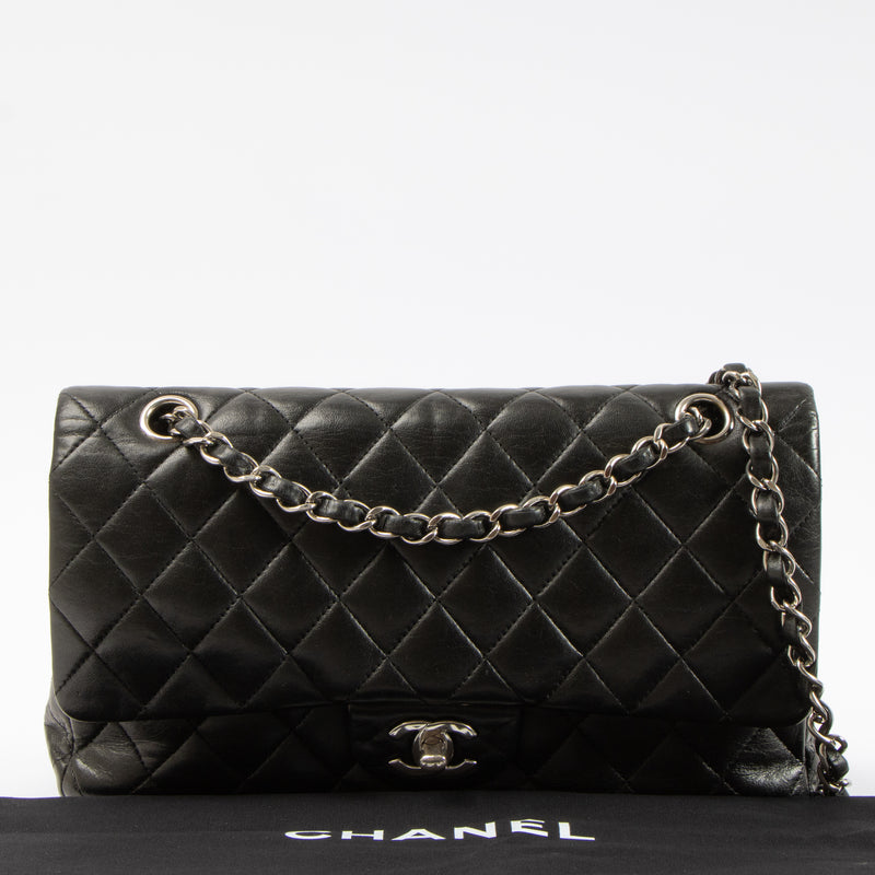 Shop this authentic Chanel Black Lambskin Medium Classic 11.12 Handbag pre-loved on Labellov.com