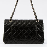 Shop this authentic Chanel Black Lambskin Medium Classic 11.12 Handbag pre-loved on Labellov.com