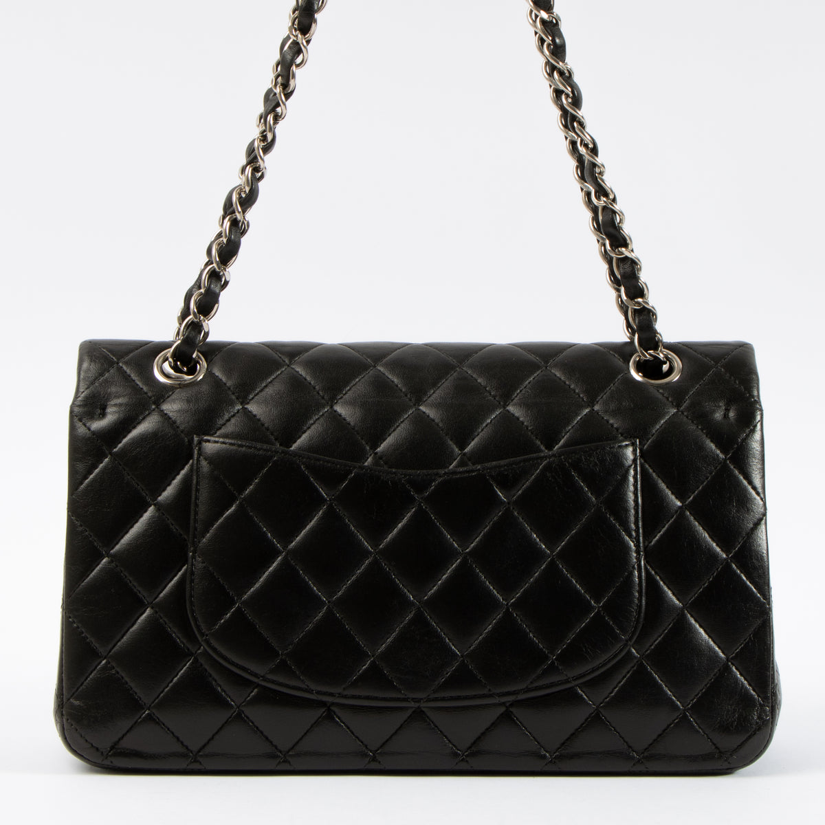 Shop this authentic Chanel Black Lambskin Medium Classic 11.12 Handbag pre-loved on Labellov.com