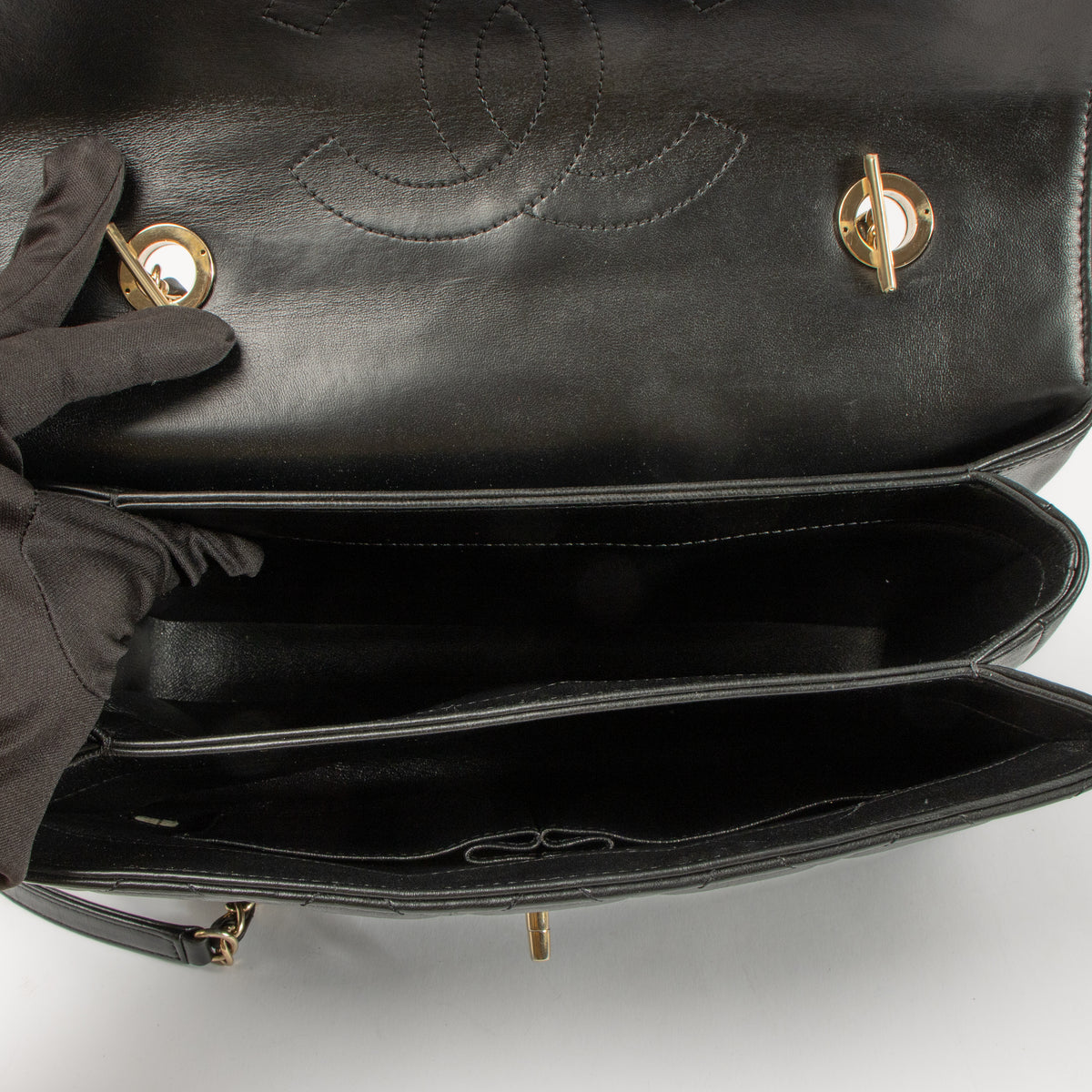 Shop this authentic Chanel Black Lambskin Medium Trendy CC Bag pre-loved on Labellov.com