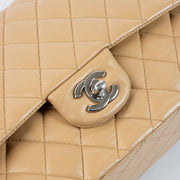 Shop this authentic Chanel Dark Beige Lambskin Medium Classic 11.12 Handbag pre-loved on Labellov.com